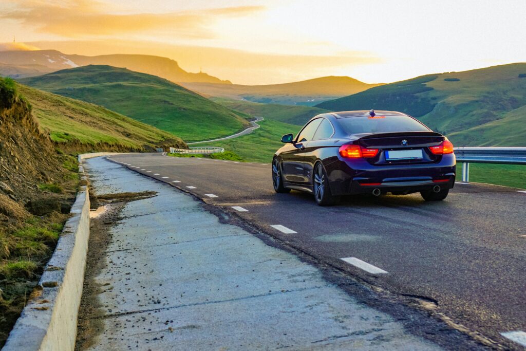 Black car on roadway